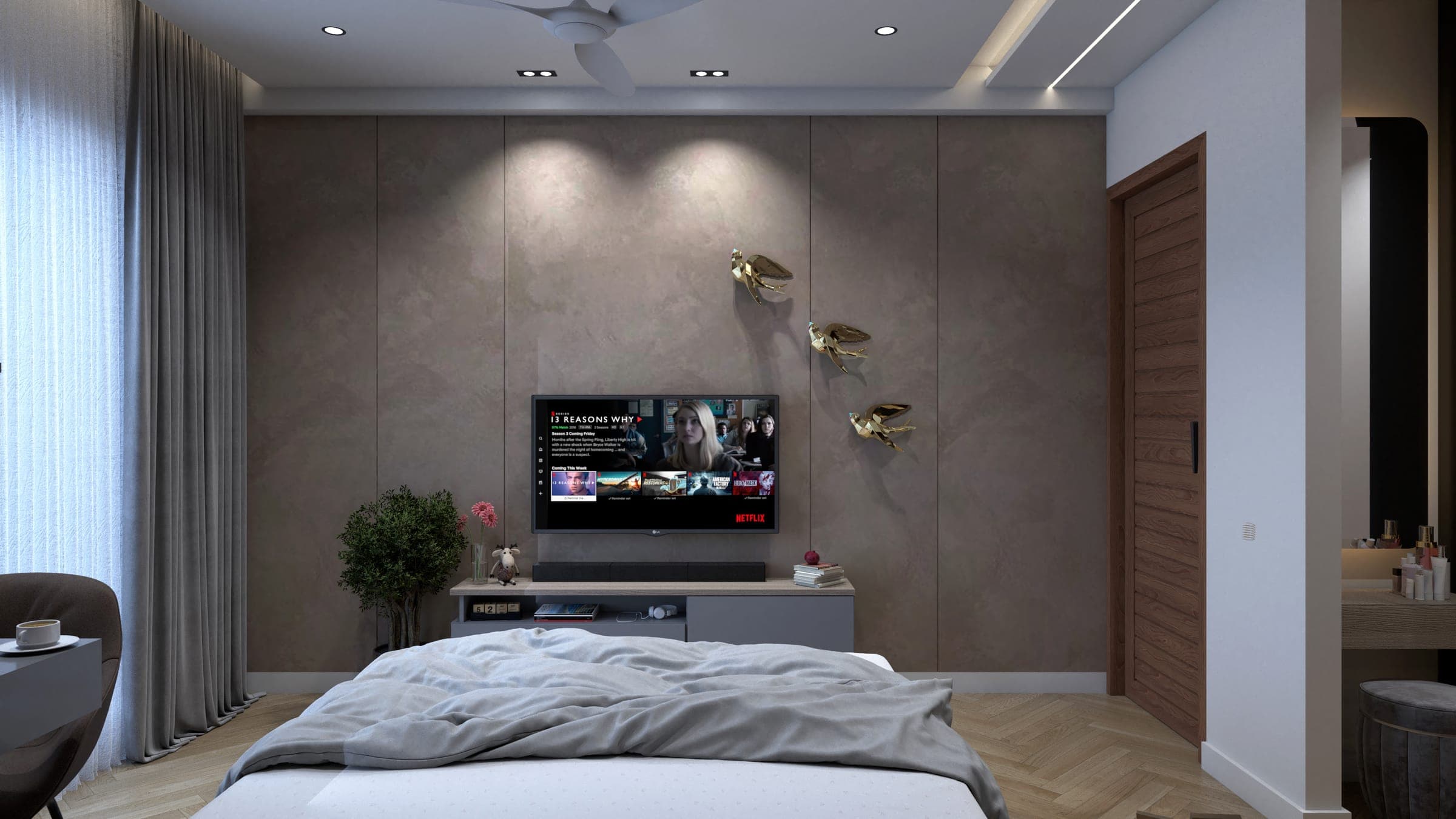 Rendered bedroom with a taupe textured TV wall, three brass bird wall sculptures, a low media console and a potted plant.